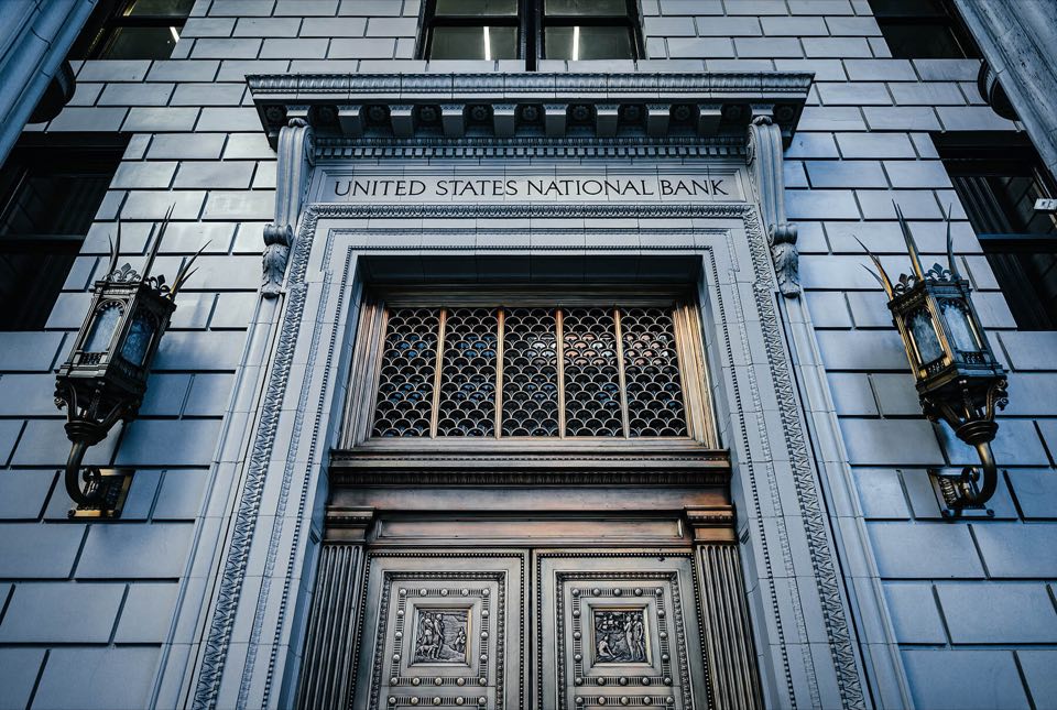 The carved stone entrance of a United States national bank building